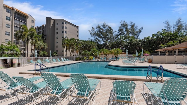 3910 Inverrary Blvd Unit 101-B, Lauderhill, FL 33319 - community pool featuring a patio