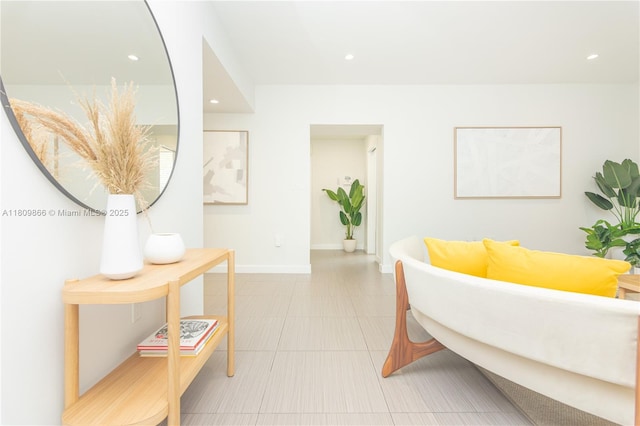 168 NE 47th St, Miami, FL 33137 - hallway featuring recessed lighting, baseboards, and light tile patterned floors