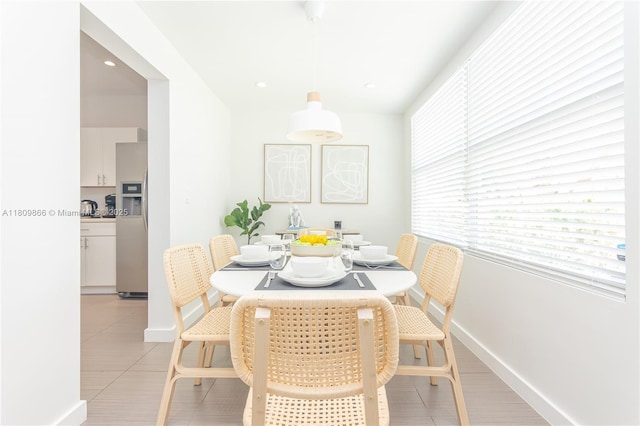 168 NE 47th St, Miami, FL 33137 - dining room featuring baseboards, recessed lighting, and light tile patterned floors
