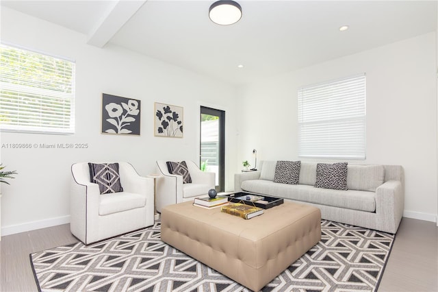168 NE 47th St, Miami, FL 33137 - living room featuring healthy amount of natural light, baseboards, wood finished floors, beam ceiling, and recessed lighting
