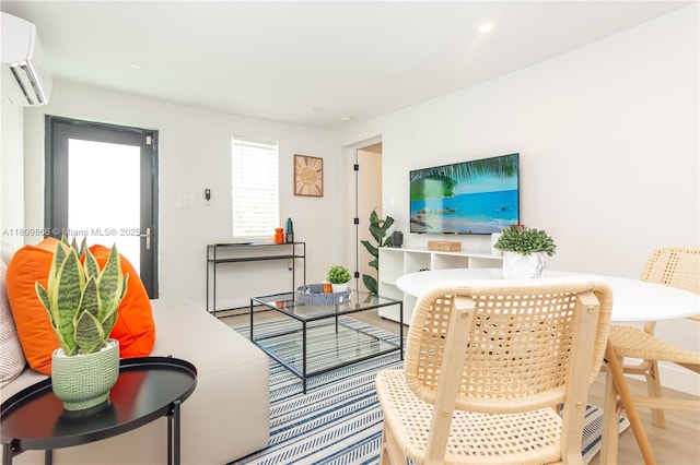 168 NE 47th St, Miami, FL 33137 - living area with a wall unit AC, recessed lighting, and wood finished floors