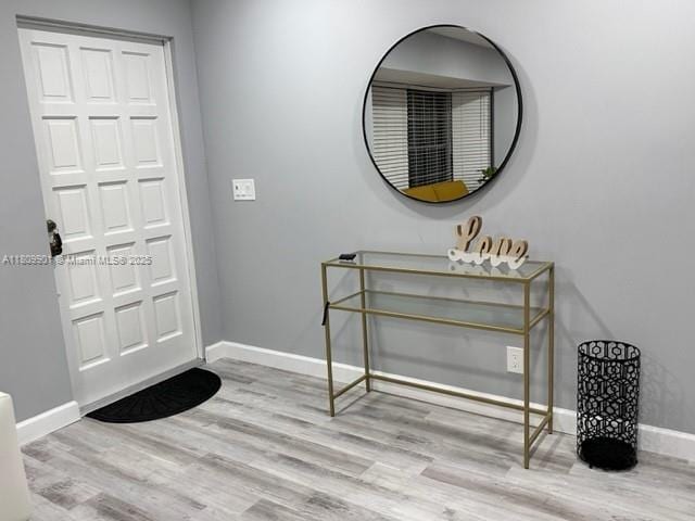 2359 Gabriel Ln, West Palm Beach, FL 33406 - entrance foyer featuring baseboards and wood finished floors