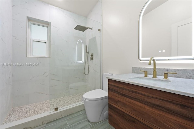 11505 NE 11th Pl, Biscayne Park, FL 33161 - bathroom featuring a marble finish shower, vanity, and toilet
