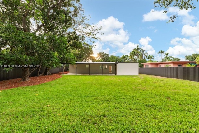 11505 NE 11th Pl, Biscayne Park, FL 33161 - back of property with a patio area