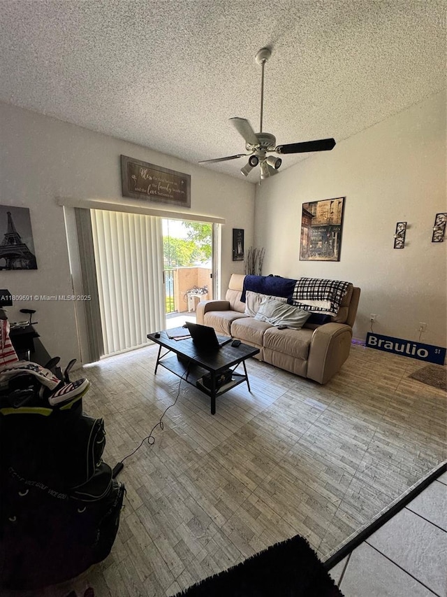 2151 NW 96th Ter Unit 15G, Pembroke Pines, FL 33024 - living room featuring a ceiling fan, a textured ceiling, and wood finished floors