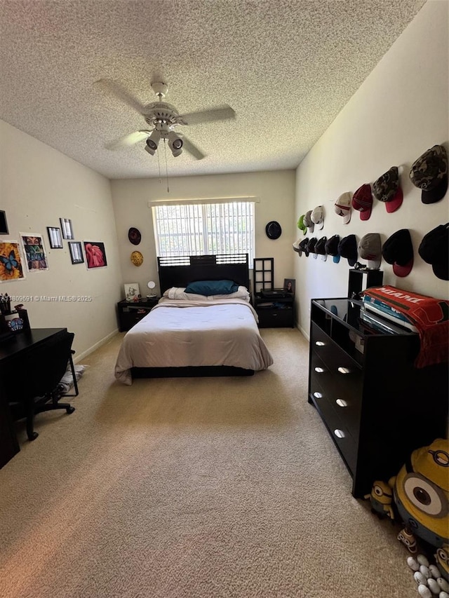 2151 NW 96th Ter Unit 15G, Pembroke Pines, FL 33024 - bedroom with light colored carpet, a textured ceiling, and ceiling fan
