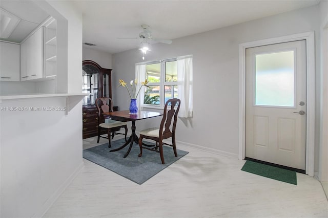 2597 SE 7th Ct, Homestead, FL 33033 - dining area featuring healthy amount of natural light, baseboards, and a ceiling fan