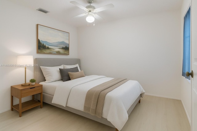 2597 SE 7th Ct, Homestead, FL 33033 - bedroom with baseboards, ceiling fan, and wood finished floors