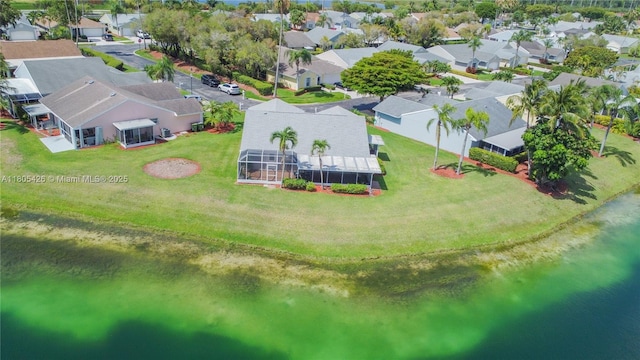 2597 SE 7th Ct, Homestead, FL 33033 - aerial perspective of suburban area with a large body of water