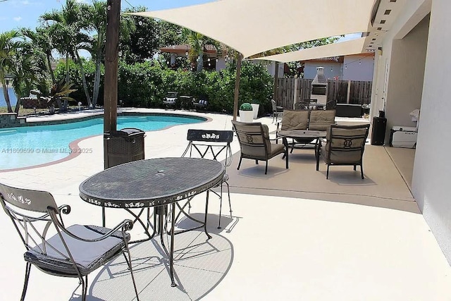 16272 SW 42nd Ter, Miami, FL 33185 - swimming pool featuring a patio area