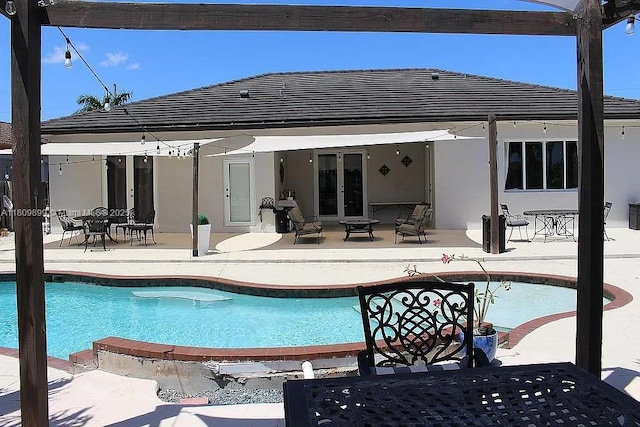 16272 SW 42nd Ter, Miami, FL 33185 - outdoor pool featuring outdoor dining space, a patio, and french doors