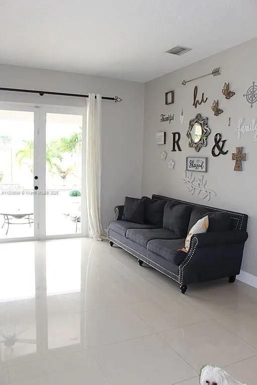 16272 SW 42nd Ter, Miami, FL 33185 - tiled living area featuring baseboards