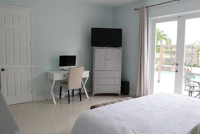 16272 SW 42nd Ter, Miami, FL 33185 - tiled bedroom featuring access to outside, french doors, and baseboards