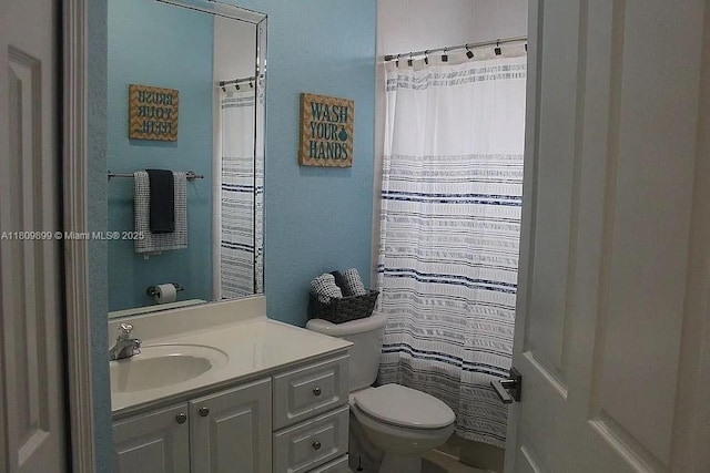16272 SW 42nd Ter, Miami, FL 33185 - bathroom with toilet, vanity, and a shower with shower curtain