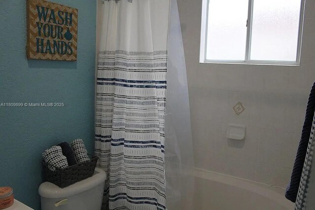 16272 SW 42nd Ter, Miami, FL 33185 - bathroom featuring toilet and shower / tub combo