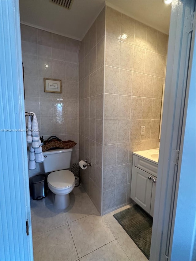 10054 SW 163rd Ct, Miami, FL 33196 - bathroom featuring tile walls, toilet, tile patterned floors, and vanity
