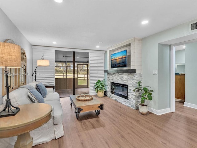 1489 Fairway Rd, Pembroke Pines, FL 33026 - living room with wood finished floors, a fireplace, baseboards, and recessed lighting
