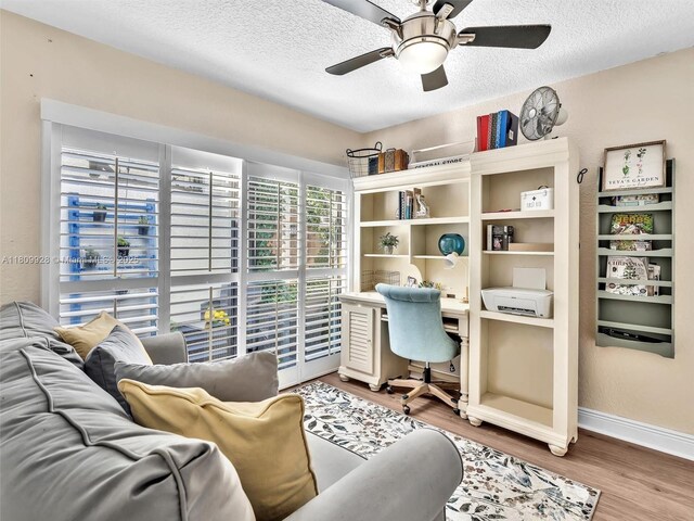 1489 Fairway Rd, Pembroke Pines, FL 33026 - office area featuring a ceiling fan, wood finished floors, a textured ceiling, and baseboards