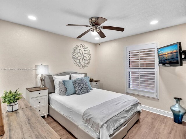 1489 Fairway Rd, Pembroke Pines, FL 33026 - bedroom with light wood finished floors, baseboards, recessed lighting, and ceiling fan