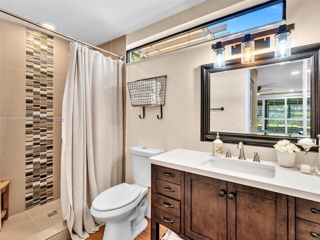 1489 Fairway Rd, Pembroke Pines, FL 33026 - bathroom with vanity, toilet, and a tile shower