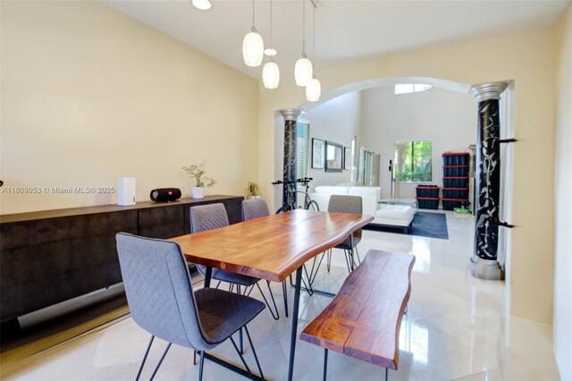 7753 SW 193rd St, Cutler Bay, FL 33157 - dining space with arched walkways, ornate columns, and recessed lighting