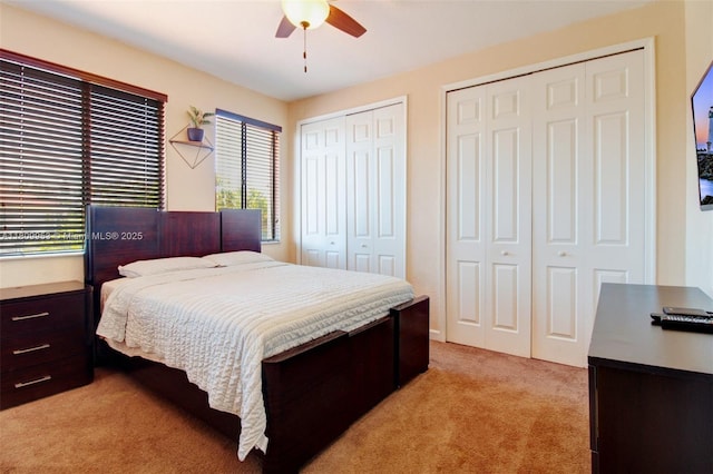 7753 SW 193rd St, Cutler Bay, FL 33157 - bedroom with light carpet, multiple closets, multiple windows, and ceiling fan