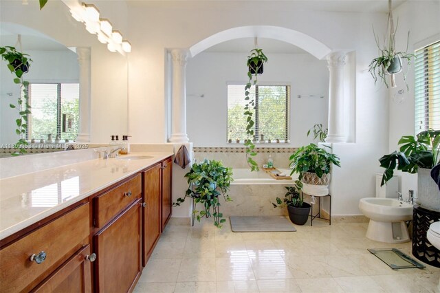 7753 SW 193rd St, Cutler Bay, FL 33157 - full bathroom with decorative columns, a bidet, vanity, and a bath