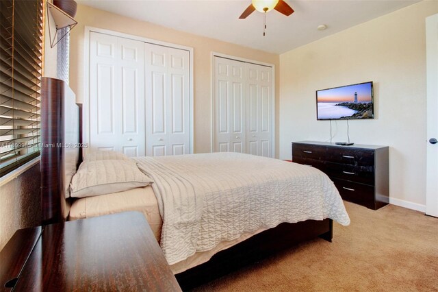 7753 SW 193rd St, Cutler Bay, FL 33157 - bedroom featuring multiple closets, carpet flooring, baseboards, and a ceiling fan