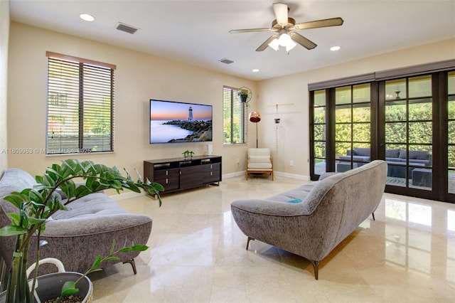 7753 SW 193rd St, Cutler Bay, FL 33157 - living area featuring a ceiling fan, baseboards, recessed lighting, and light marble finish floors