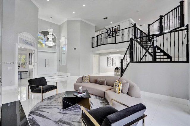 10457 Laurel Rd, Davie, FL 33328 - living area featuring a towering ceiling, ornamental molding, recessed lighting, tile patterned floors, and stairway