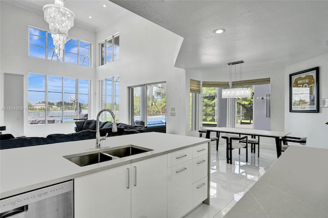 10457 Laurel Rd, Davie, FL 33328 - kitchen with dishwasher, a sink, recessed lighting, light tile patterned floors, and light countertops