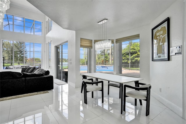 10457 Laurel Rd, Davie, FL 33328 - dining space with baseboards and light tile patterned floors