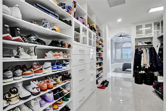 10457 Laurel Rd, Davie, FL 33328 - walk in closet featuring ceiling fan and tile patterned floors