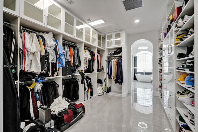 10457 Laurel Rd, Davie, FL 33328 - walk in closet featuring tile patterned floors