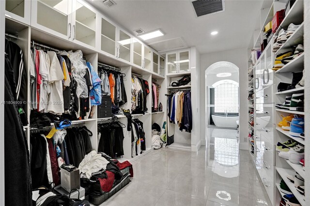 10457 Laurel Rd, Davie, FL 33328 - walk in closet featuring tile patterned floors