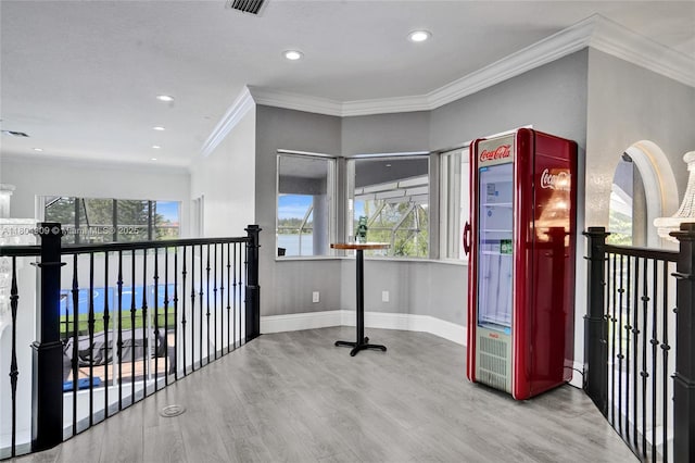 10457 Laurel Rd, Davie, FL 33328 - corridor featuring wood finished floors, baseboards, recessed lighting, and crown molding