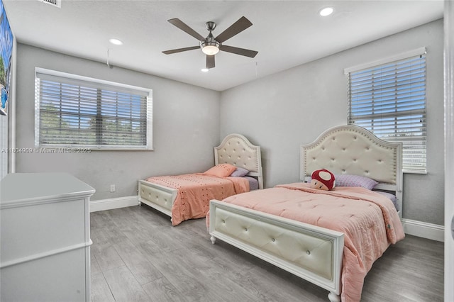 10457 Laurel Rd, Davie, FL 33328 - bedroom with baseboards, wood finished floors, recessed lighting, and a ceiling fan