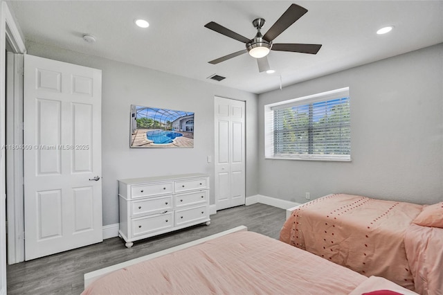 10457 Laurel Rd, Davie, FL 33328 - bedroom featuring baseboards, wood finished floors, recessed lighting, ceiling fan, and a closet