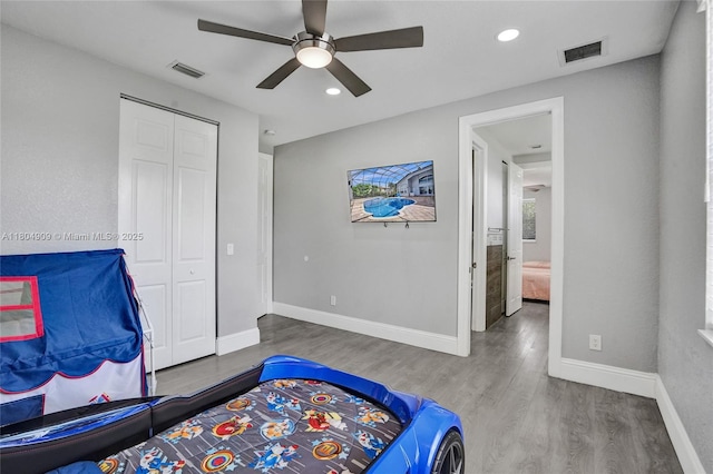 10457 Laurel Rd, Davie, FL 33328 - bedroom with wood finished floors, baseboards, a closet, recessed lighting, and ceiling fan