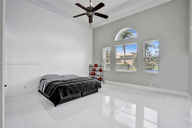 10457 Laurel Rd, Davie, FL 33328 - bedroom with ornamental molding, tile patterned flooring, baseboards, a high ceiling, and ceiling fan
