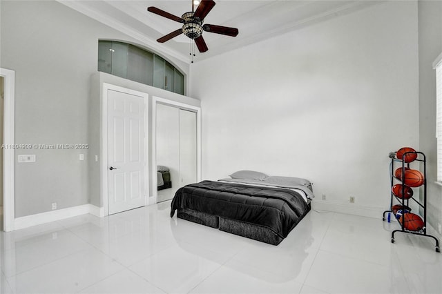 10457 Laurel Rd, Davie, FL 33328 - tiled bedroom with crown molding, baseboards, a closet, and ceiling fan