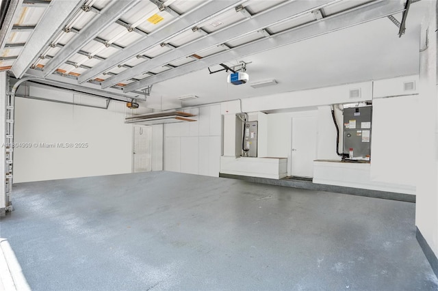 10457 Laurel Rd, Davie, FL 33328 - garage featuring heating unit and a garage door opener