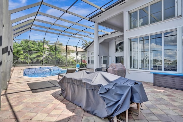 10457 Laurel Rd, Davie, FL 33328 - view of patio with an outdoor hot tub, an outdoor pool, glass enclosure, and a grill