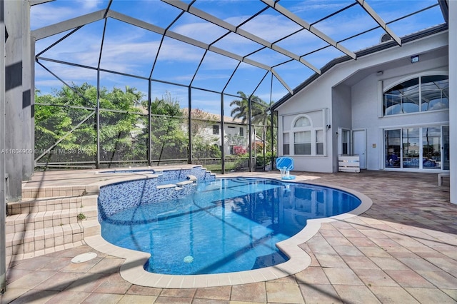 10457 Laurel Rd, Davie, FL 33328 - swimming pool with a jacuzzi, a patio area, and a lanai