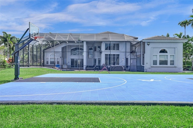 10457 Laurel Rd, Davie, FL 33328 - view of sport court featuring basketball hoop and a lawn