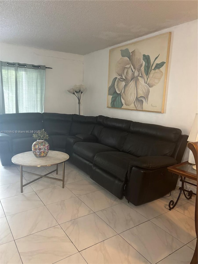 15428 SW 85th Ln Unit 159, Miami, FL 33193 - living room featuring a textured ceiling