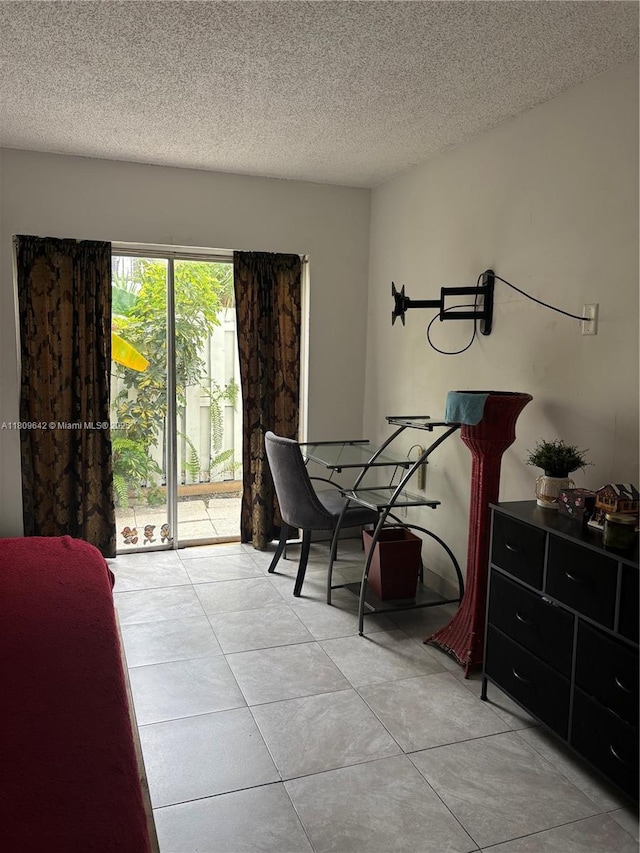 15428 SW 85th Ln Unit 159, Miami, FL 33193 - dining room featuring a textured ceiling and light tile patterned floors