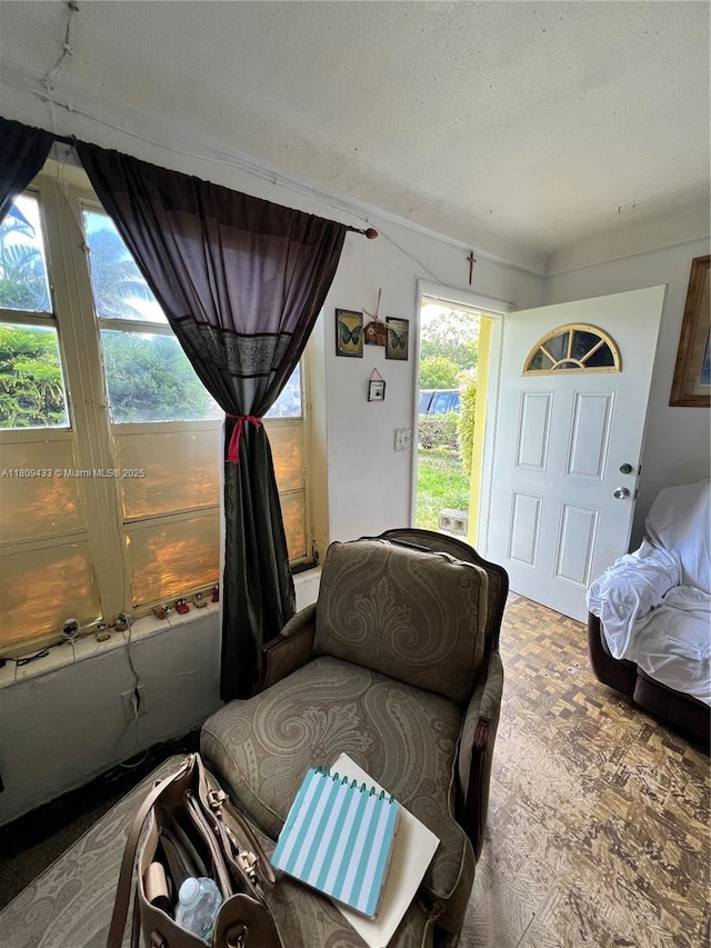 7821 NW 30th St, Davie, FL 33024 - sitting room featuring wood finished floors and a textured ceiling