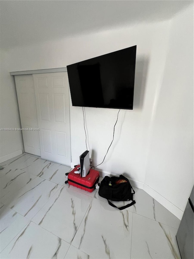 7821 NW 30th St, Davie, FL 33024 - unfurnished bedroom with marble look tiles and baseboards