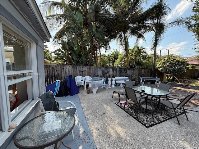 7951 NW 30th St, Davie, FL 33024 - fenced backyard featuring a patio area and outdoor dining area